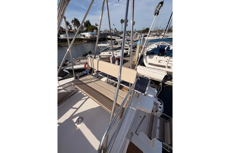 Slide: The Image of 2021 Cutwater C-32 CB boat with wooden steps and sleek interior design. - 32