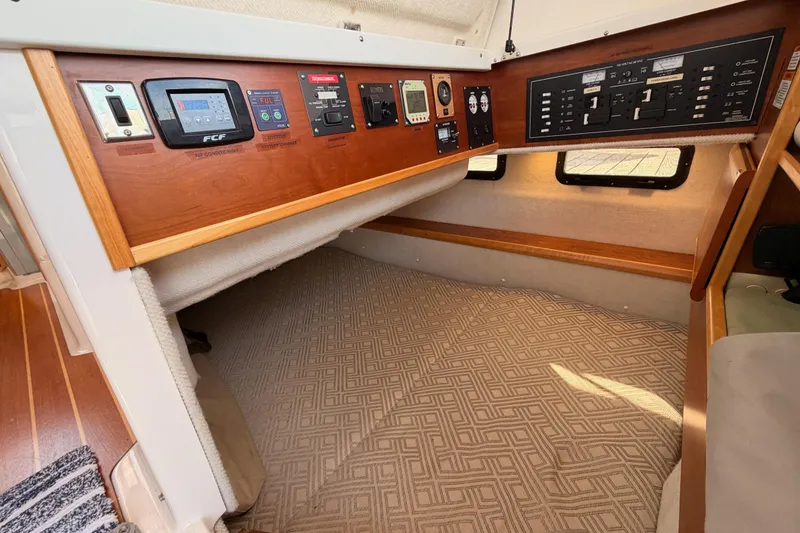 Slide: The Image of Interior of 2021 Cutwater C-32 CB yacht with elegant wood finishes and modern amenities. - 41