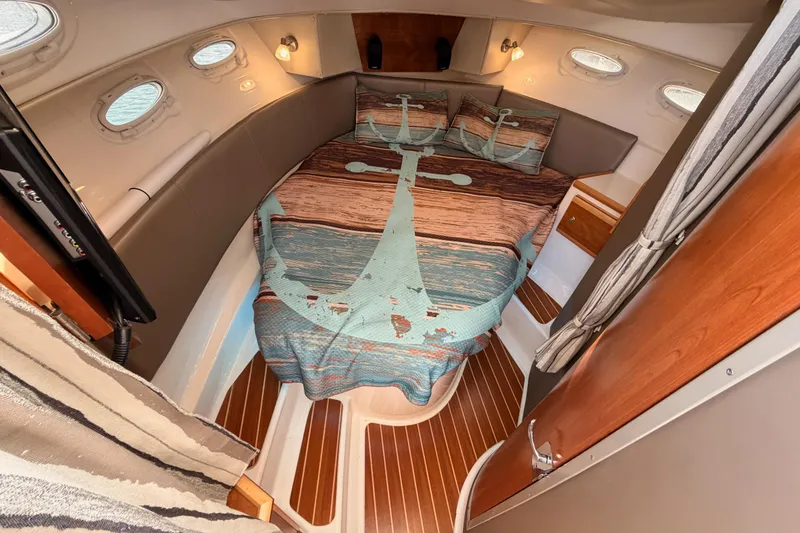 Slide: The Image of Control panel of 2021 Cutwater C-32 CB boat with joystick and switches. - 57