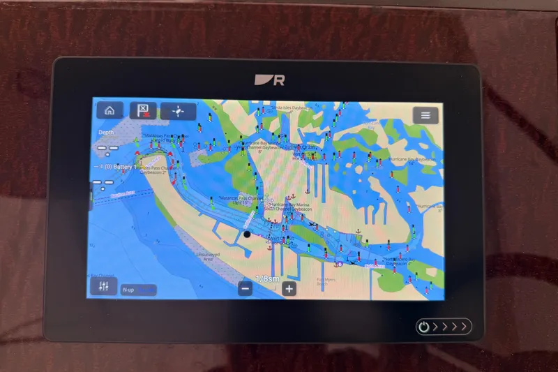 Slide: The Image of Navigation display on a 2012 Sea Ray Sundancer 310 showing a detailed marine map. - 6