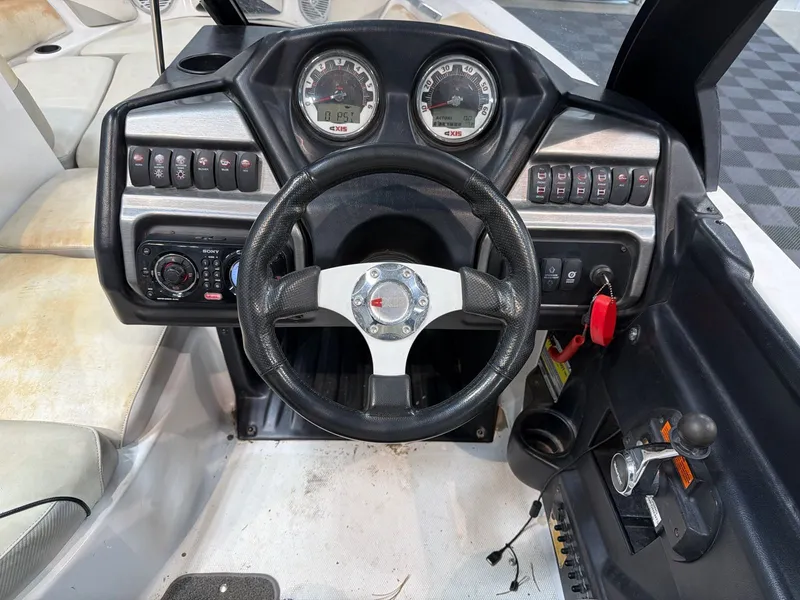 Slide: The Image of Interior view of Axis A20 boat cockpit, year 2011. - 13