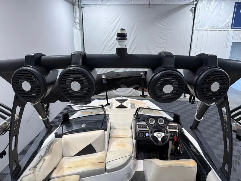 Slide: The Image of Interior view of a 2011 Axis A20 boat with speakers. - 18