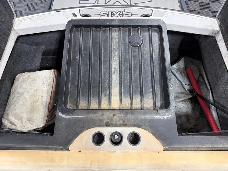 Slide: The Image of Storage compartment in 2011 Axis A20 boat with accessories. - 19