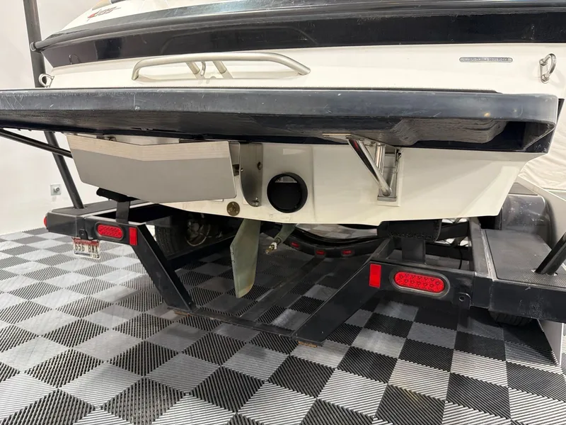 Slide: The Image of Rear view of a 2011 Axis A20 boat on a trailer. - 5