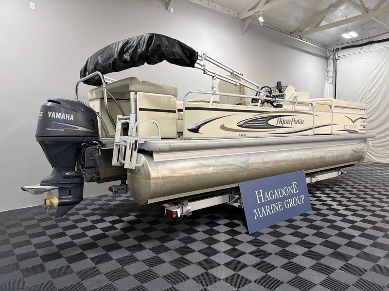 Slide: The Image of 2007 Godfrey Aqua Patio 240RE pontoon boat with Yamaha engine in showroom. - 3