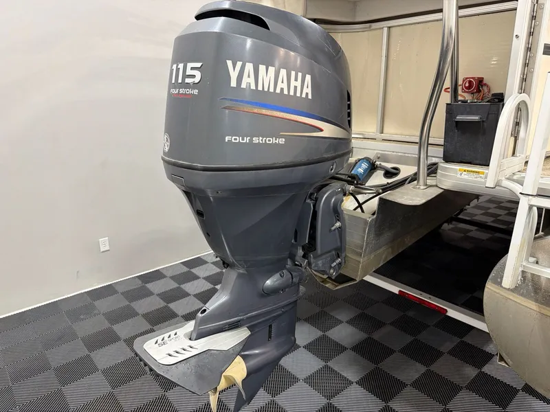 Slide: The Image of Yamaha 115 HP outboard motor on Godfrey Aqua Patio 240RE. - 5