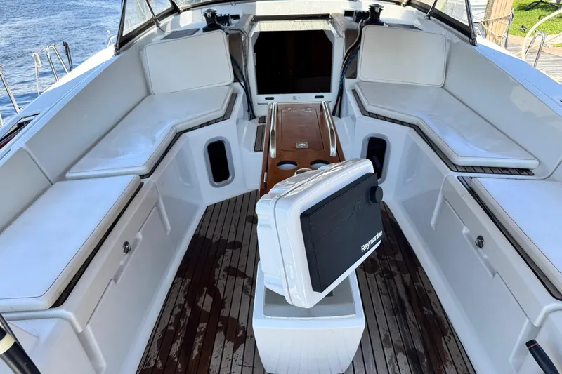 Slide: The Image of Cockpit of 2020 Jeanneau Sun Odyssey 44 DS sailboat with seating and navigation equipment. - 10