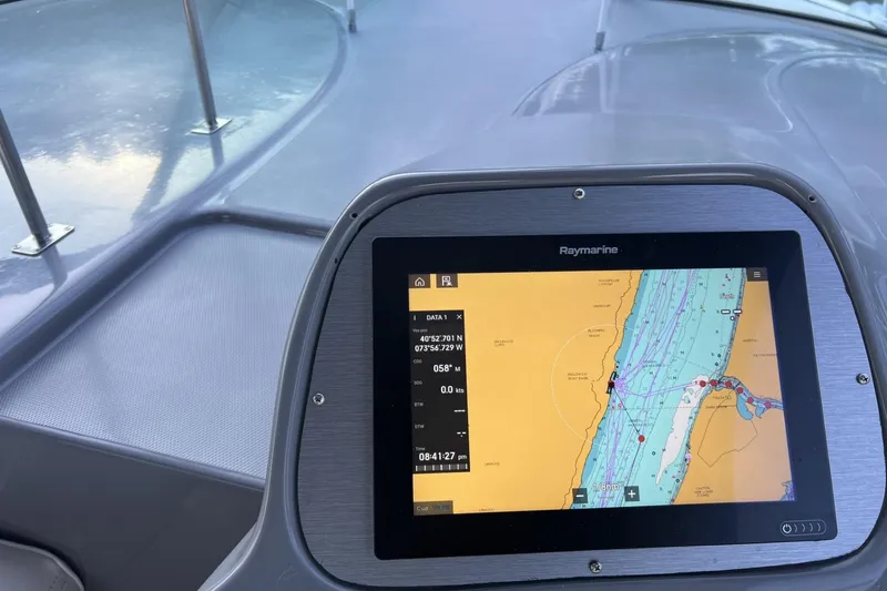 Slide: The Image of Raymarine navigation display on 2005 Cruisers Yachts 370 Express boat deck. - 14