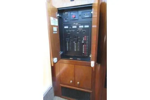 Slide: The Image of Electrical panel of 2005 Cruisers Yachts 370 Express, featuring switches and controls. - 29