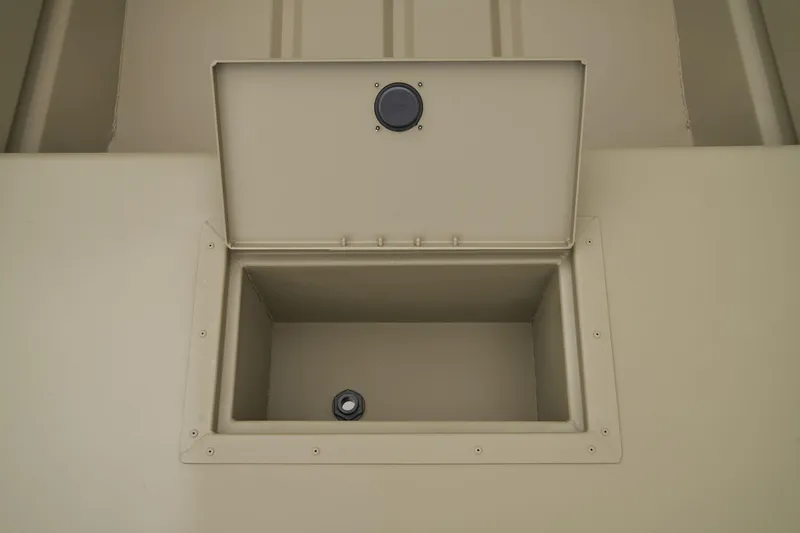 Slide: The Image of Manufacturer Provided Image: Open storage compartment in 2026 Tracker Grizzly 15 Jon boat. - 12