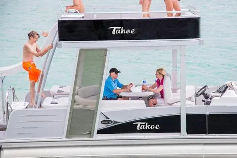 Slide: The Image of Manufacturer Provided Image: 2017 Tahoe Pontoon Cascade Platinum Funship Cruise - 25' on water with people enjoying. - 11