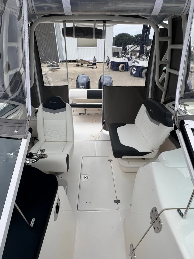 Slide: The Image of Interior view of 2023 Robalo R247 Dual Console boat. - 20