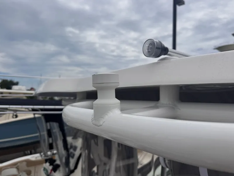 Slide: The Image of Close-up of a 2023 Robalo R247 Dual Console boat detail. - 36