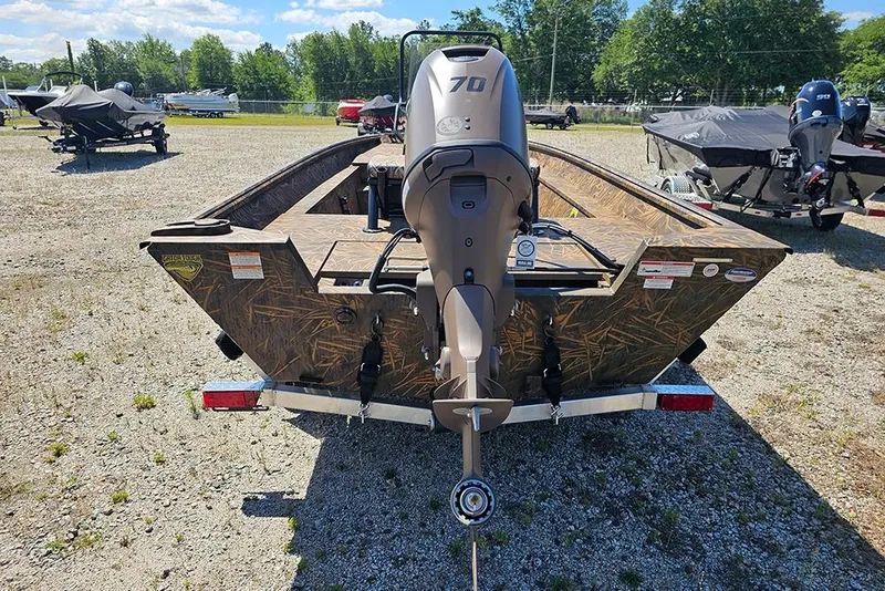 Slide: The Image of 2026 G3 Gator Tough 17 CC boat interior with camouflage pattern and seating. - 26