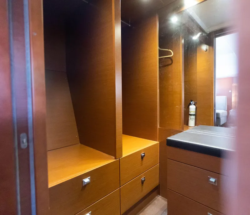Slide: The Image of Luxurious wooden closet interior on a 2014 Prestige 550 Fly yacht. - 36