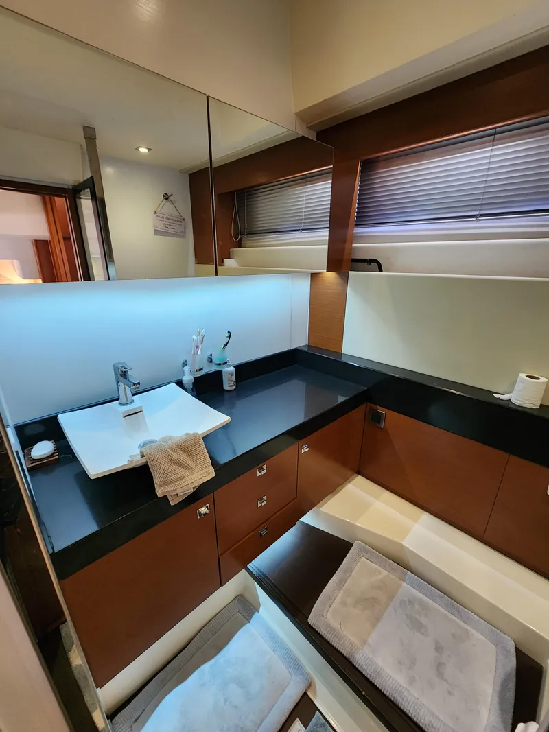 Slide: The Image of Luxurious bathroom interior of 2014 Prestige 550 Fly yacht with modern fixtures and sleek design. - 37