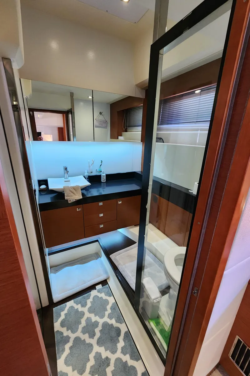 Slide: The Image of Luxurious bathroom in 2014 Prestige 550 Fly yacht with modern fixtures and elegant design. - 45