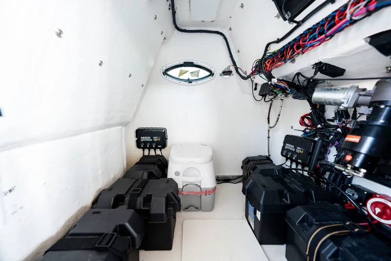 Slide: The Image of Interior of 2023 Twin Vee 260 GFX CC with electronics and battery. - 34