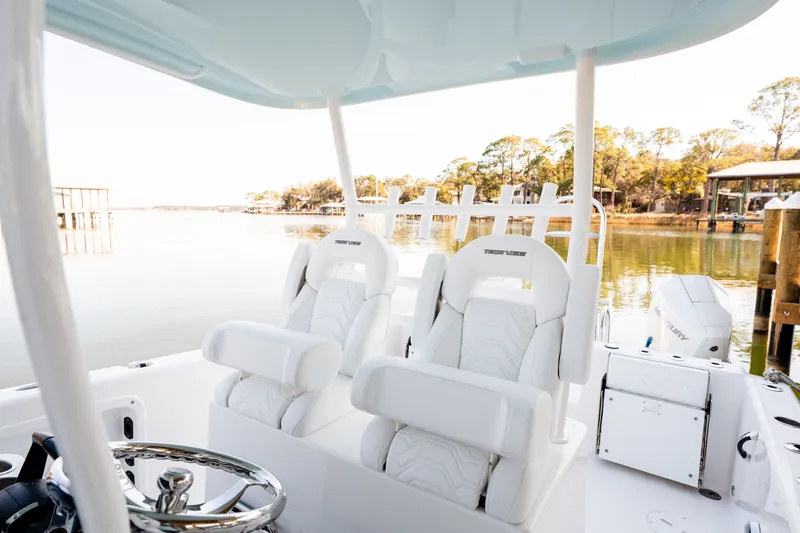 Slide: The Image of Interior of 2023 Twin Vee 260 GFX CC boat with white seats. - 42