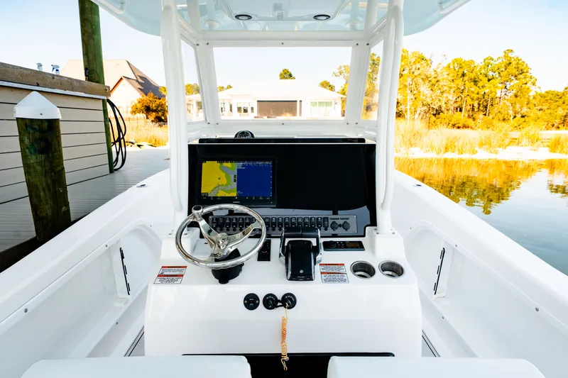 Slide: The Image of Interior view of 2023 Twin Vee 260 GFX CC boat with helm console. - 45