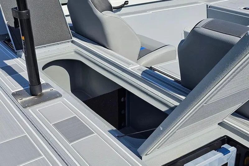 Slide: The Image of 2026 G3 Sportsman 1810 SE boat interior with open storage compartment and seating. - 13