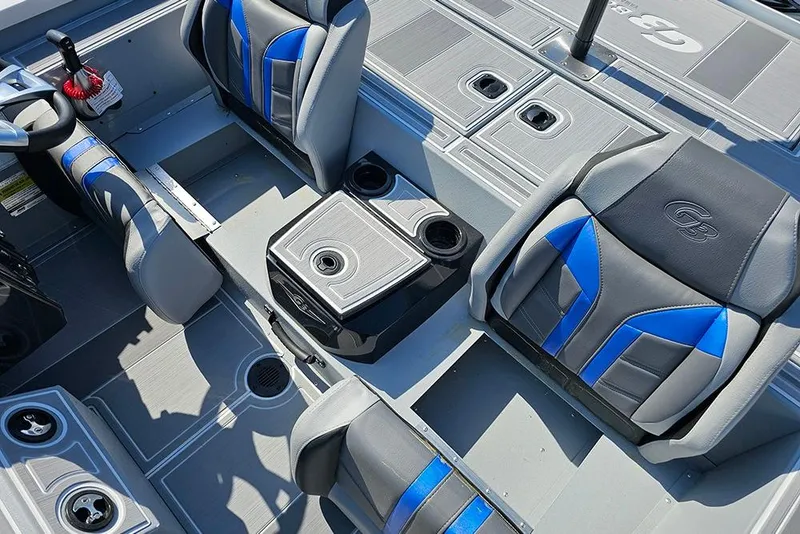 Slide: The Image of 2026 G3 Sportsman 1810 SE boat interior with blue and gray seating and storage compartments. - 16