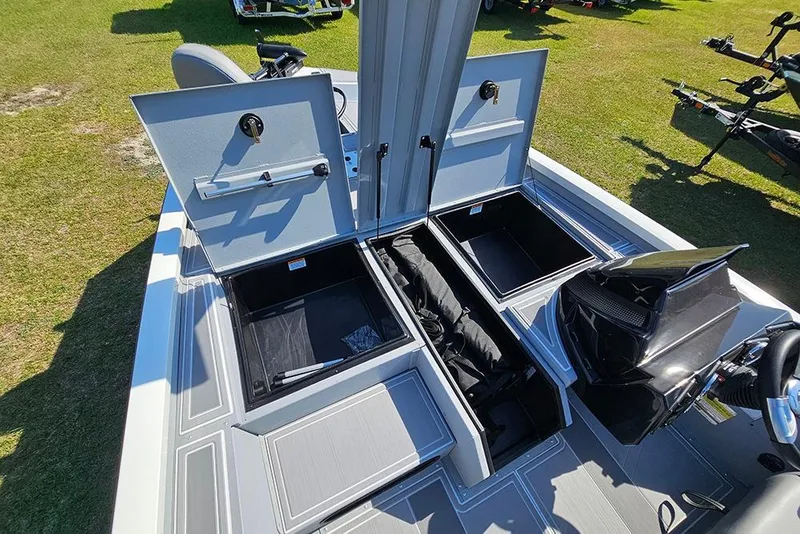Slide: The Image of 2026 G3 Sportsman 1810 SE boat with open storage compartments on deck. - 21