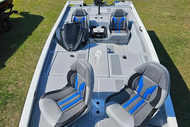 Slide: The Image of 2026 G3 Sportsman 1810 SE boat interior with stylish seating on grass. - 24