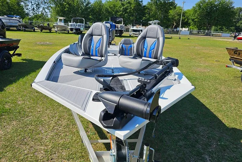 Slide: The Image of 2026 G3 Sportsman 1810 SE boat with modern seating and trolling motor on display. - 4