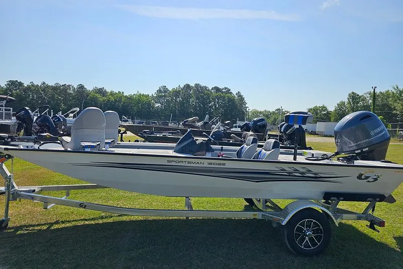 Slide: The Image of 2026 G3 Sportsman 1810 SE boat on trailer, displayed outdoors under clear sky. - 6
