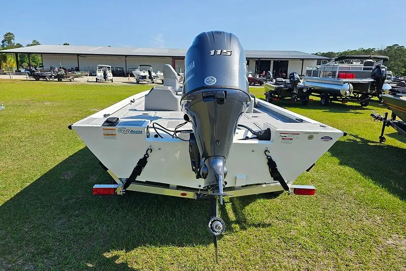 Slide: The Image of 2026 G3 Sportsman 1810 SE boat with Yamaha 115 engine, displayed outdoors. - 8