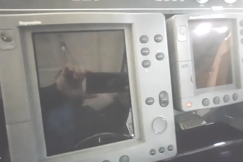 Slide: The Image of Close-up of navigation equipment on a 2003 Tiara Yachts 3100 Open LE. - 14