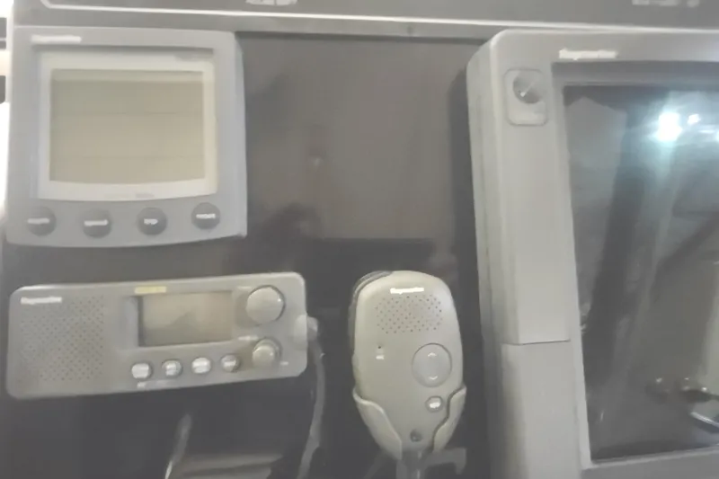 Slide: The Image of Control panel of a 2003 Tiara Yachts 3100 Open LE with navigation equipment. - 15