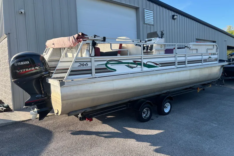 Slide: The Image of 2000 JC Manufacture 24 Dolphin pontoon boat with Yamaha VMAX engine on trailer. - 9