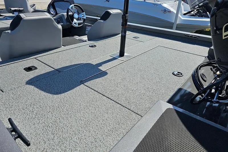 Slide: The Image of 2026 G3 Sportsman 1710 boat interior with spacious deck and modern seating. - 10