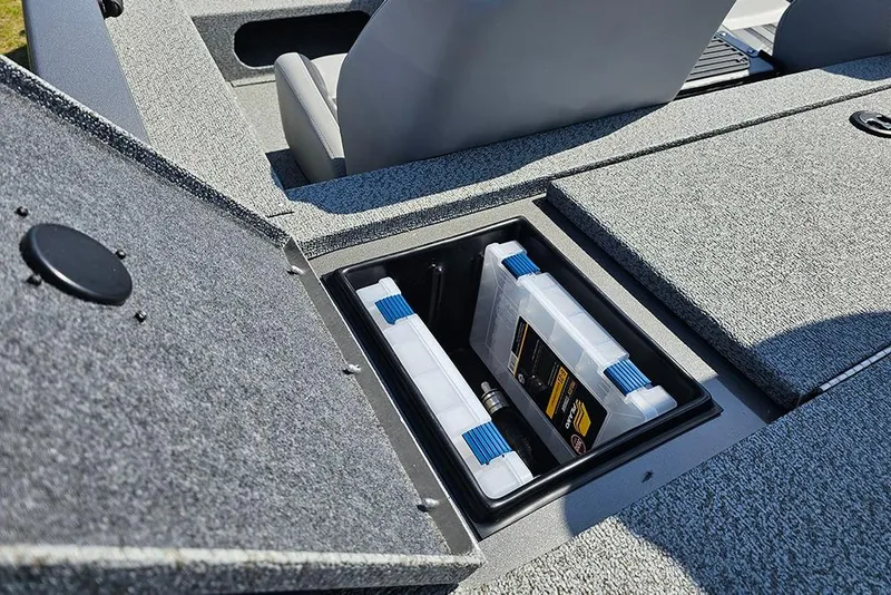 Slide: The Image of Storage compartment in 2026 G3 Sportsman 1710 boat with organized tackle boxes. - 12