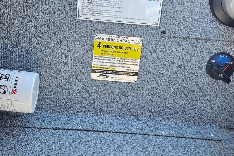 Slide: The Image of 2026 G3 Sportsman 1710 boat capacity label, showing 4-person or 650 lbs limit. - 18