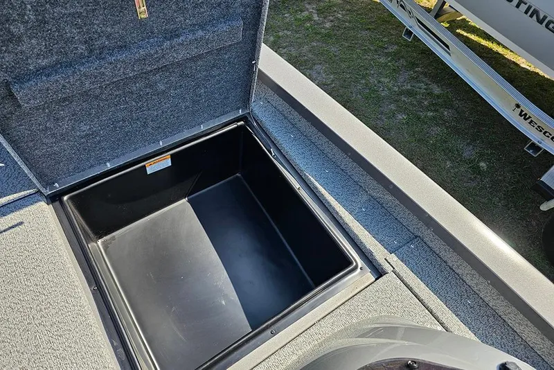 Slide: The Image of Open storage compartment on 2026 G3 Sportsman 1710 boat, showcasing spacious interior. - 20