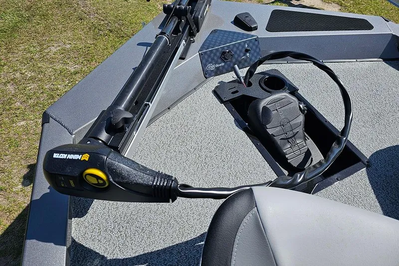 Slide: The Image of 2026 G3 Sportsman 1710 boat deck with Minn Kota trolling motor and foot pedal. - 23