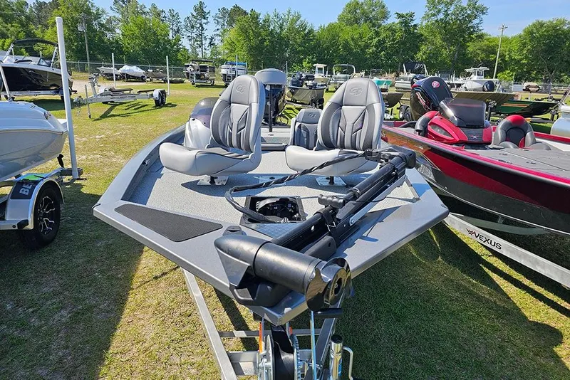 Slide: The Image of 2026 G3 Sportsman 1710 boat displayed outdoors with modern seating and equipment. - 4