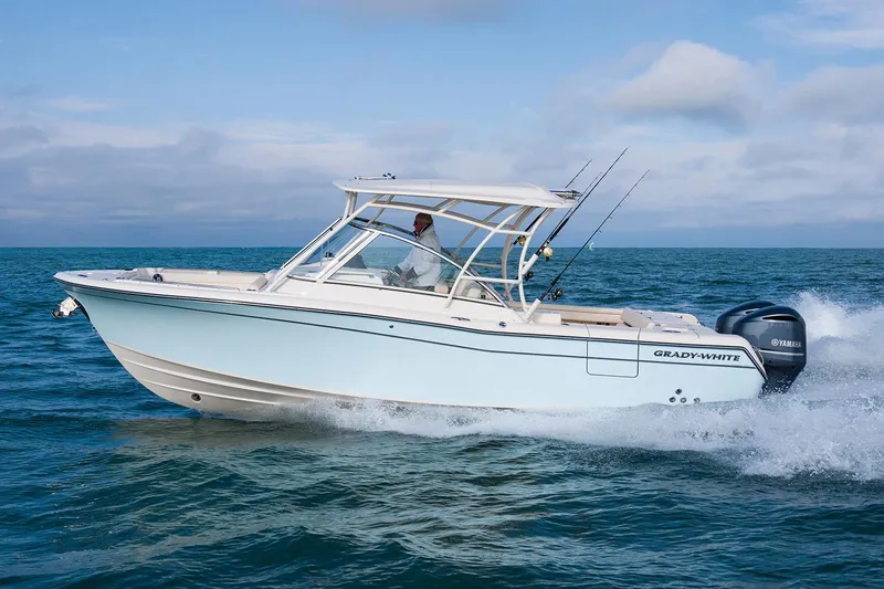 Slide: The Image of Manufacturer Provided Image: 2023 Grady-White Freedom 285 boat cruising on open water. - 4