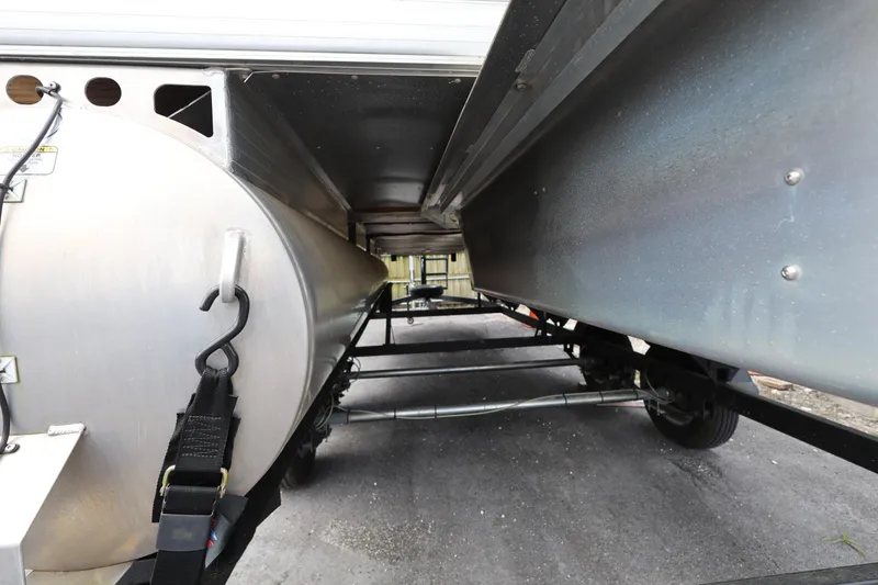 Slide: The Image of Underneath view of 2023 SUNTRACKER PB 22DLX pontoon boat, showcasing structural details. - 11