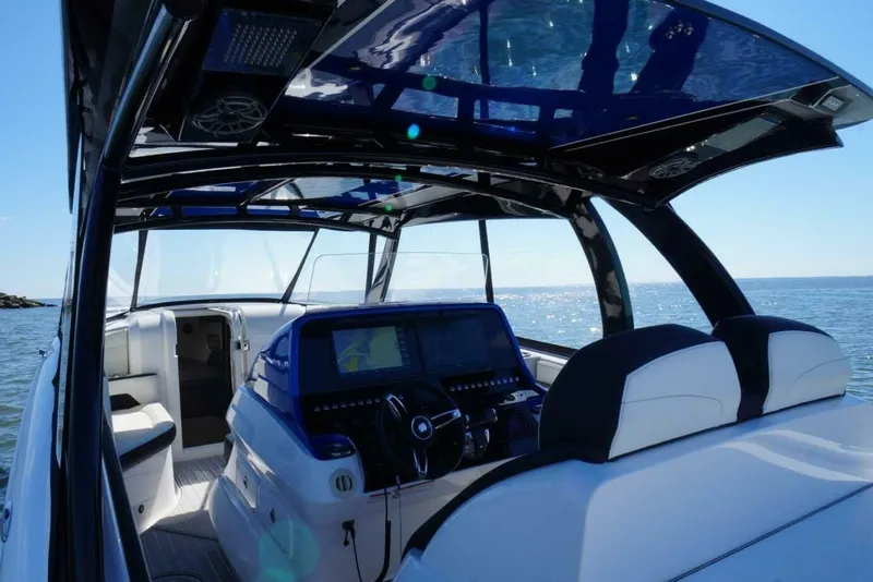 Slide: The Image of Luxurious 2020 Concept 44' Cuddy Cabin boat interior with modern helm and seating. - 10