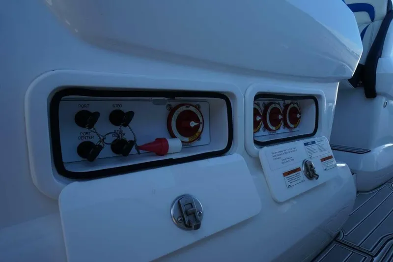 Slide: The Image of Control panel on 2020 Concept 44' Cuddy Cabin boat, featuring switches and gauges. - 13
