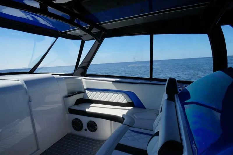 Slide: The Image of Interior of 2020 Concept 44' Cuddy Cabin boat with ocean view through windows. - 14