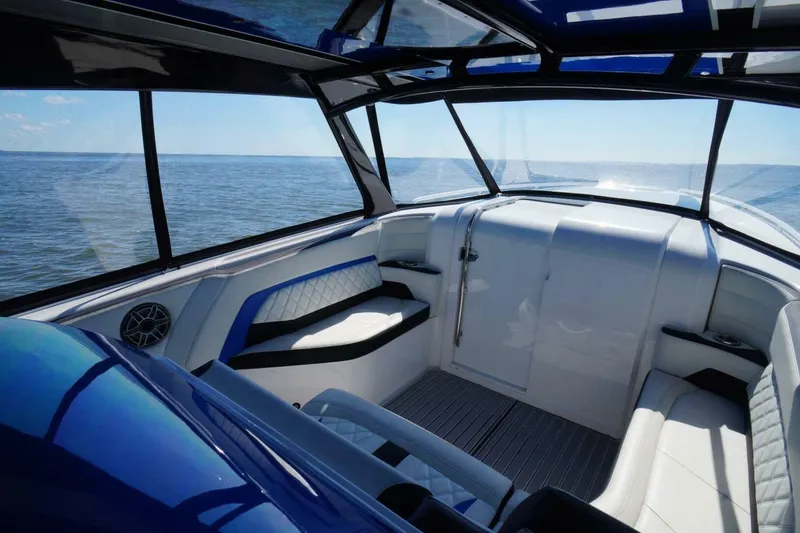 Slide: The Image of Interior of 2020 Concept 44' Cuddy Cabin boat with sleek seating and ocean view. - 16