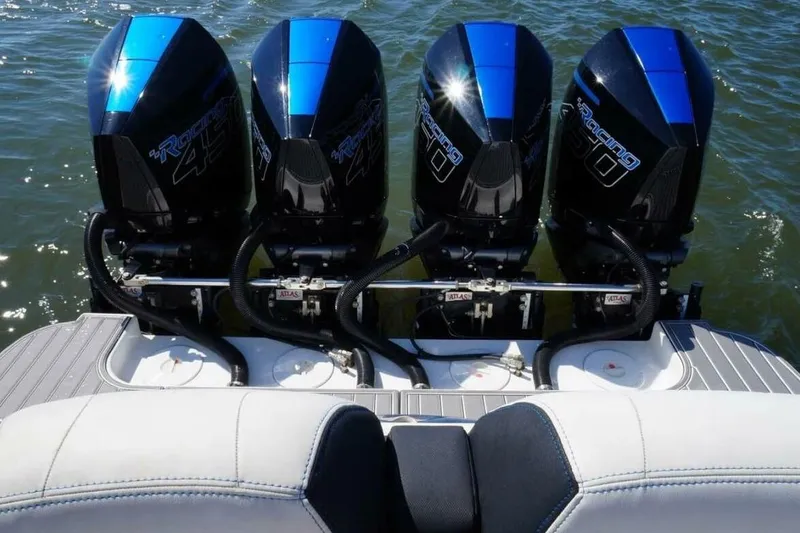 Slide: The Image of Four powerful outboard motors on a 2020 Concept 44' Cuddy Cabin boat. - 5