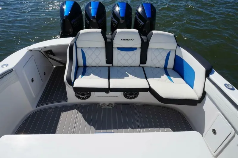 Slide: The Image of 2020 Concept 44' Cuddy Cabin boat with cushioned seating and powerful engines on water. - 6