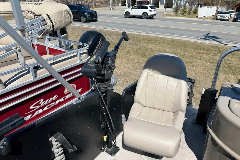 Slide: The Image of Boat interior with beige seat and motor, Premier 221 Explorer, 2013 model. - 11