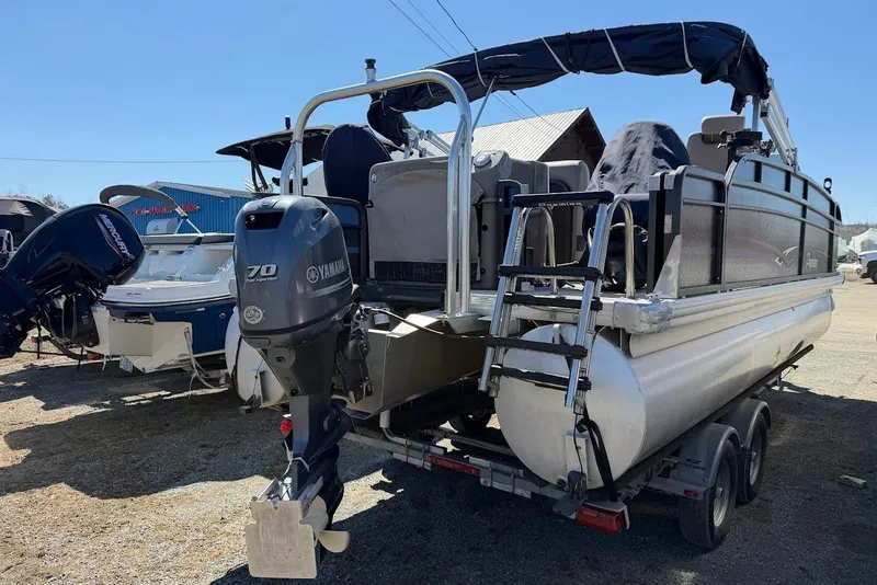 Slide: The Image of 2013 Premier 221 Explorer pontoon boat with Yamaha 70 outboard motor on trailer. - 3